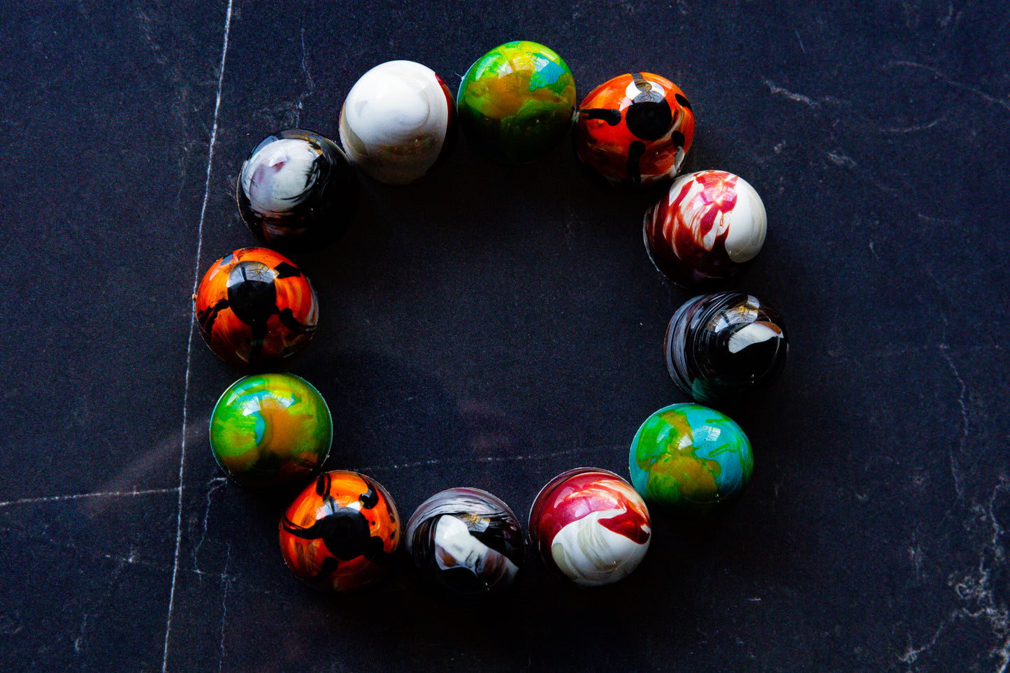 Handmade, brightly coloured, chocolate bon bons made by Chocolate Bliss
